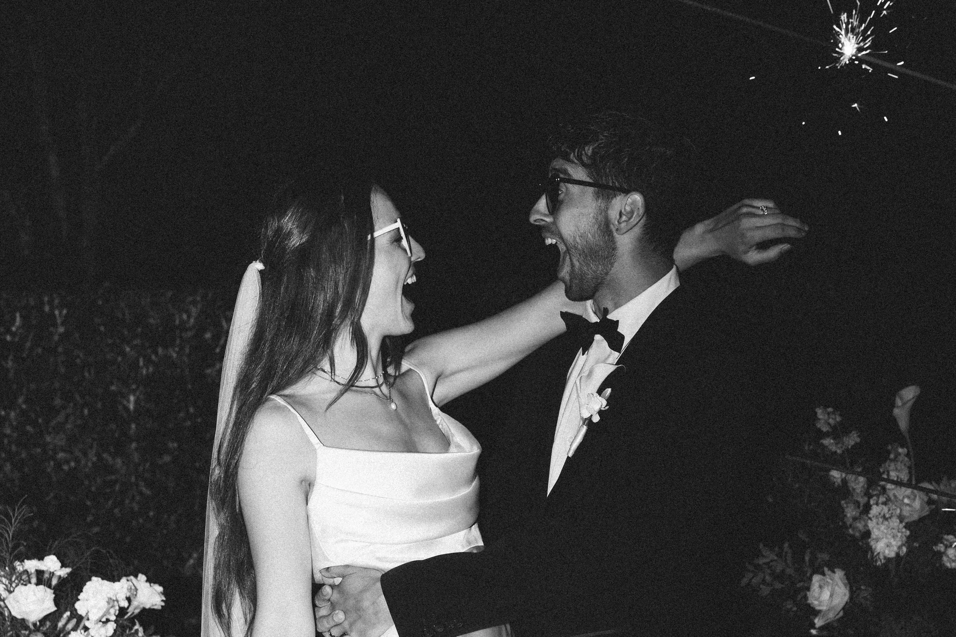 The couple, late at night, having a laugh in the dark 