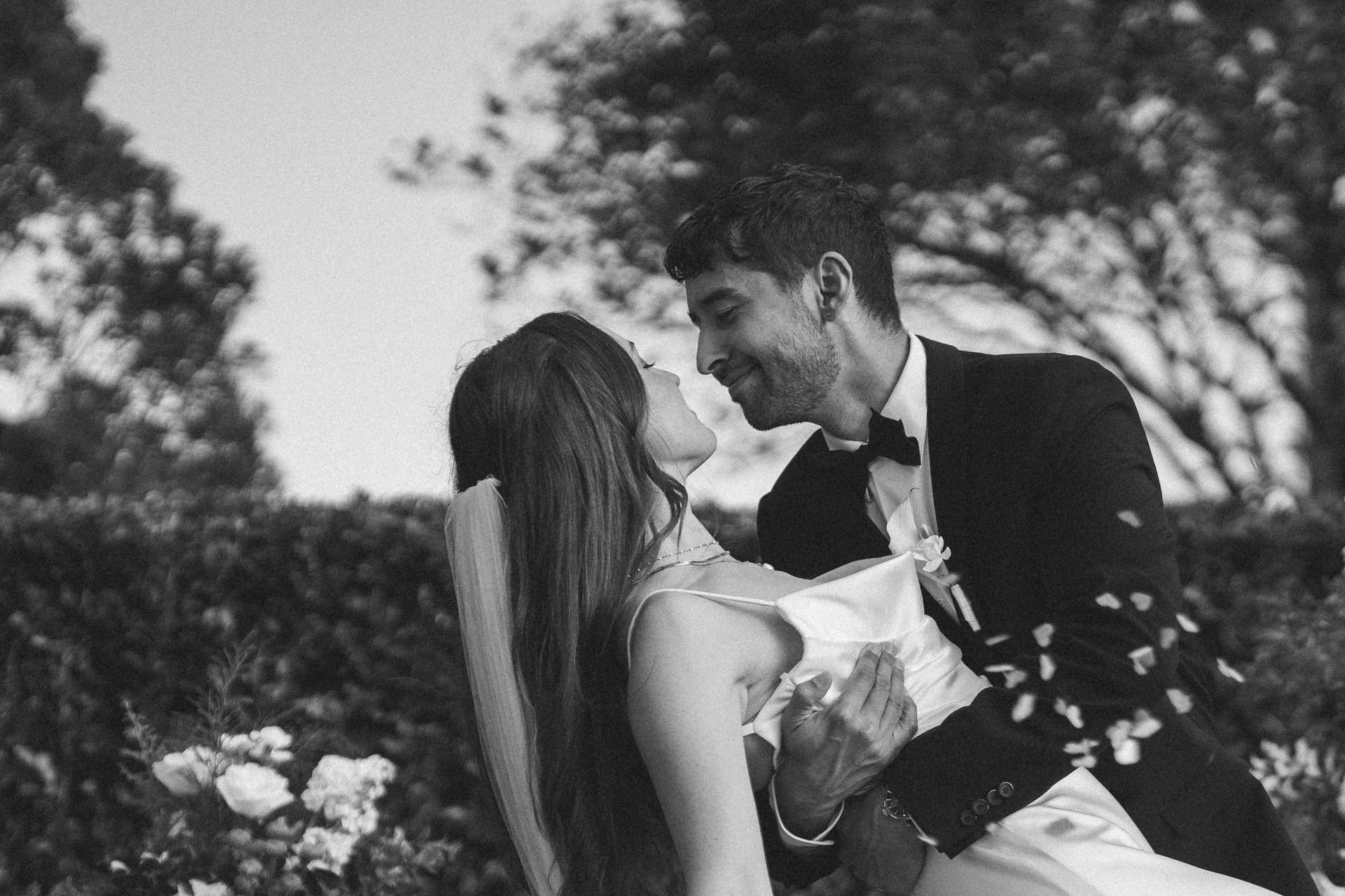 A wide, full-bleed photograph of a couple doing a dip.